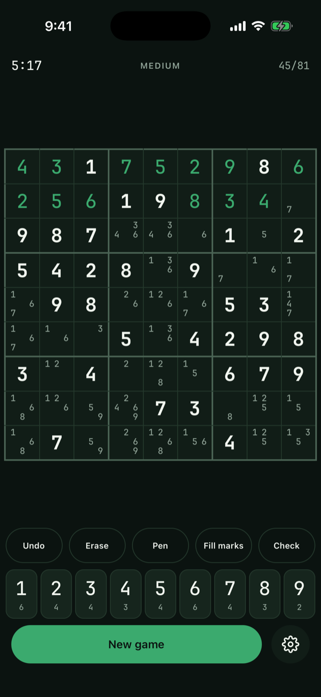 A mid game on the Classic board, placed digits in felt green and pencil marks filling the open cells
